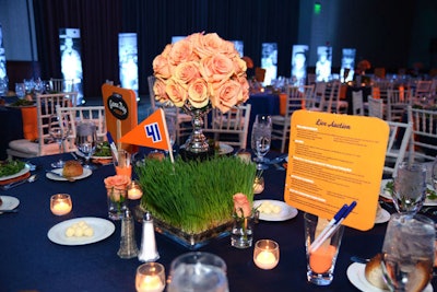 Boston nonprofit Team Impact hosted its first Game Day gala in Boston in 2012. The tailgate-inspired decor included college-style pennants and fresh grass evocative of a football field.
