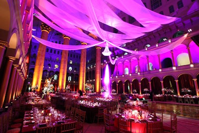 Washington’s Shakespeare Theater Company and Harman Center for the Arts honored artistic director Michael Kahn’s 25th anniversary with the company in 2011 with dinner and dancing at the National Building Museum. Purple, pink, and gold uplighting from Atmosphere Lighting accented the decor at the museum.