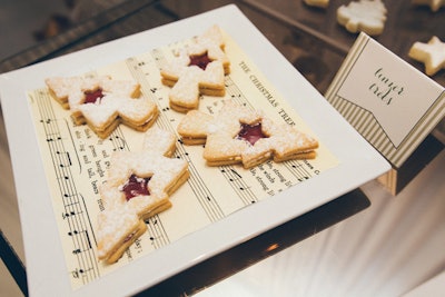 At the suite's opening-night event, Pure Kitchen Catering provided catering and Toni Patisserie and Cafe brought in seasonal treats. Linzer Torts were served on trays decked with the sheet music for Christmas carols.