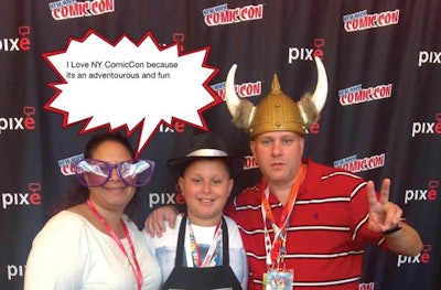 Attendees at the NYCC Pixe photo booth