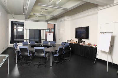 The spacious room is sunlit and ideal for meetings