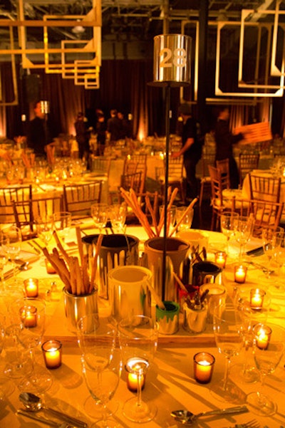 Centerpieces at the Whitney Museum of American Art gala, held in October, encouraged playful interaction, featuring silver paint cans holding breadsticks and also Sharpie markers that guests could use to draw on the canvas tablecloths.