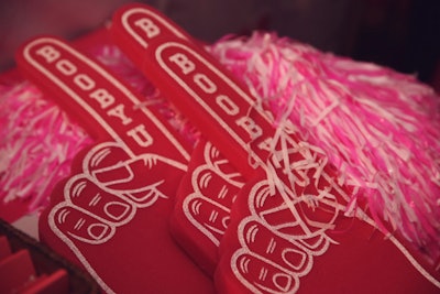 Custom foam fingers—like those seen at this year’s Boobyball benefit in Toronto—are sure to get guests in the mood to root for their favorite teams.