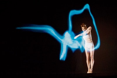 Kansas City, Missouri-based Quixotic Fusion offers an eclectic swirl of acrobatic feats, pulsing rhythms, and colorful digital images and light projections. The group can perform from five-minute openers to 75-minute features.