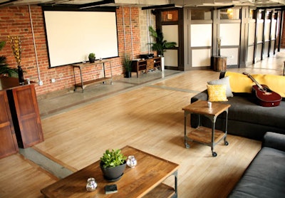 Open space with guitar and projection screen