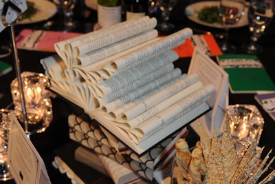 In keeping with the literary theme, tabletop decor included books created by Toronto artist Kalpna Patel. The books had pages that were artfully folded and glued together.