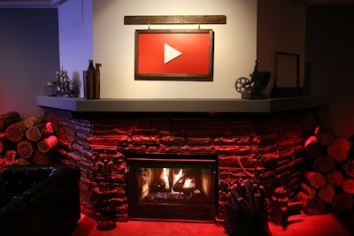 The fireplace was already a part of the space, but planners spruced it up with piles of logs and the YouTube logo.