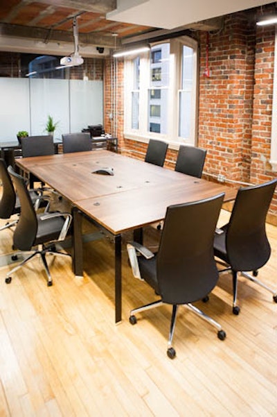 Conference table with brick background