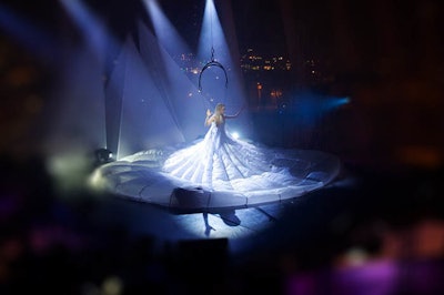 Custom dress designed to fly and act as a projection surface