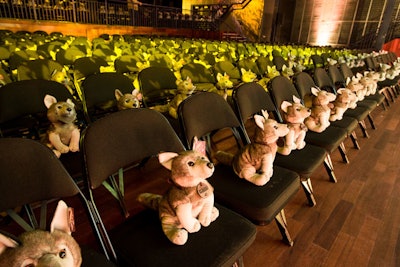 After the success of distributing stuffed penguins at the Frozen Planet premiere, Discovery Communications started giving out plush toys at other events for the channel's blue chip shows. The screening for Klondike saw stuffed huskies placed on each seat. And as it was a 94-minute screening, the organizers provided boxed snacks to tide guests over before the reception opened. At the theater entrance, staffers handed out containers that held chips and dip as well as a packet of trail mix.