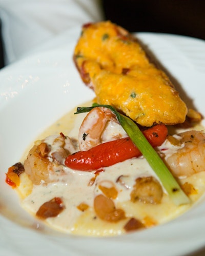 Breakers executive chef Jeff Simms created the menu to pay homage to his Southern heritage. The first course was low country shrimp and grits served with jalapeño pimento cheese toast, prepared by Breakers chef Susan Marsh. 'It's not low-calorie, I will warn you,' Simms said.