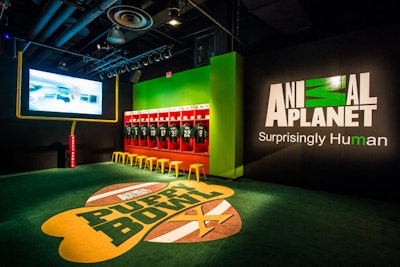 A mini locker room with puppy-size jerseys lined the entrance to the Puppy Bowl Experience.