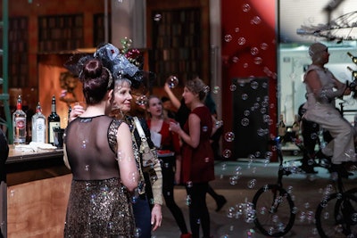 While waiting at the bar, guests were surrounded by a cloud of bubbles that poured out of a nearby machine.