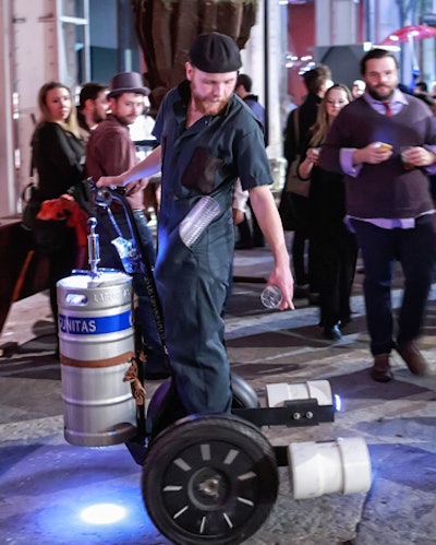 One server rolled around on a Segway-like contraption that held a keg of beer. He rolled up to guests and poured drinks on the spot.