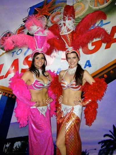 Models wearing “show girl” costumes for Vegas event