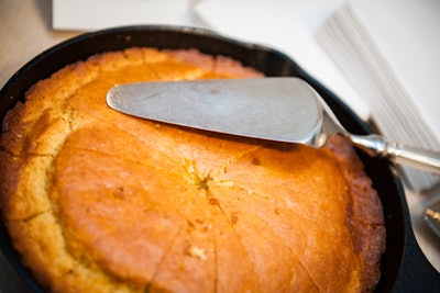 In addition to buttered biscuits, the buffet tables held cornbread served in cast-iron skillets.