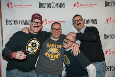 Guests used the props to create goofy photo opportunities in front of the step-and-repeat, a wall that showcased the logos of such sponsors as Boston Common magazine.