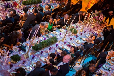 Candelabras and topiaries like mini boxwoods topped tables at the BET Honors dinner.