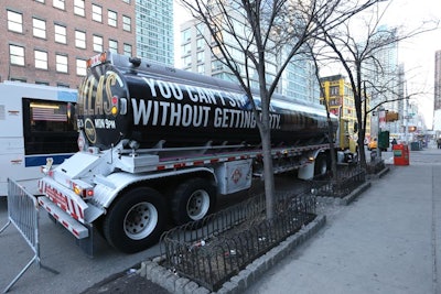 As part of the promotional campaign, Grey took over billboards and wrapped oil tankers with signage that read, 'You can't strike oil without getting dirty' and 'Fill 'er up.'