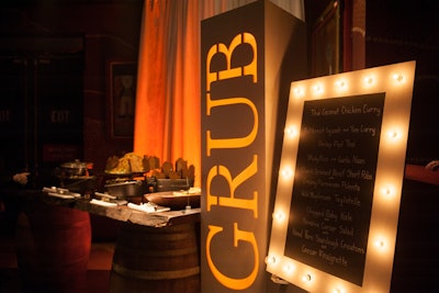 Corinthian Events designed the event, bringing in bright marquee lights and a bright orange 'Grub' sign to denote the buffet area.