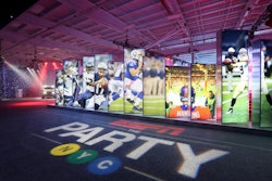 The logo of ESPN the Party, which illuminated the floor near the entrance, included a playful take on the New York subway system with 'NYC' mimicking the colors and shapes used to identify the train's different lines. Maxim also used subway imagery on the custom T-shirts worn by staffers.