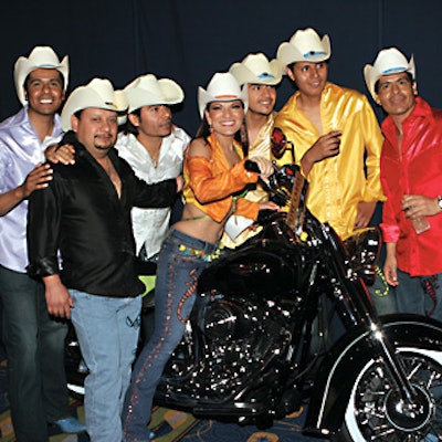 Diana Reyes and her band posed on a hog set up backstage at the 2006 Billboard Latin Music awards as part of Harley-Davidson's sponsorship of the show.