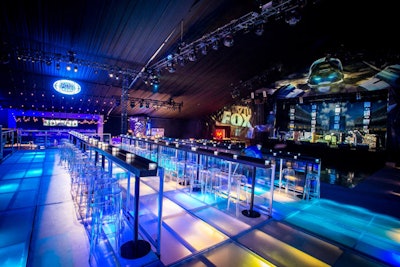 With so many of the Super Bowl events taking place late at night, lighting became an important element. Fox's Saturday-night bash used more than 650 lights in its tent and on stage; the lights became part of the decor in the tiered lounges where clear stools complemented the colorful lights beneath the floor. Los Angeles-based Kinetic Lighting handled the event's lighting.