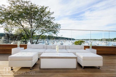 Floor-to-ceiling windows, open-air balconies, and lushly landscaped grounds.