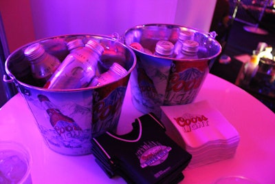Nods to football—the players, the teams, and other thematic imagery—were common at many Super Bowl parties and promotions. At Maxim, Coors Light offered jersey-shaped koozies alongside bottles of its brew.