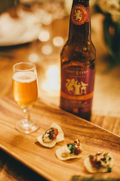 In New York, Naturally Delicious catering prepared a five-course meal with beer pairings last week. The feast began with foie and fig potato chips with spiced walnuts, paired with Brewery Ommegang Rare Vos Amber Ale.