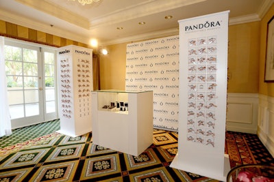 In Pandora's suite at the Four Seasons Hotel Los Angeles at Beverly Hills during the Golden Globes HBO Luxury Lounge, the brand made a game out of gifting. Each guest was invited to open a bow-tied drawer and retrieve a card that corresponded to a gift from the fashion jewelry brand.