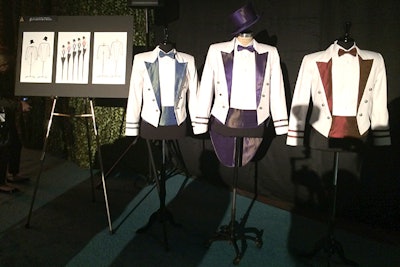 Staff uniforms will feature colorful details on formal white tie outfits.