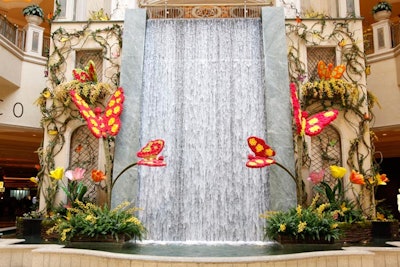 Giant six-foot tulips and 10- and 6-foot flowered butterflies created photo opportunities throughout the Waterfall Atrium and Gardens at the Palazzo Las Vegas for Spring 2011. The centerpiece of the garden was a 25-foot gently flapping butterfly that used motion-sensor technology to blink at passersby.