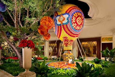 The hot-air balloon stands 20 feet tall and weighs 4,000 pounds, while the carousel is 13 feet tall, 16 feet wide, and weighs 6,000 pounds. Both installations feature theatrical lighting and are accompanied by festive music. Bailey said he looked to childhood inspirations to complement the existing whimsical theme of the Wynn atrium.