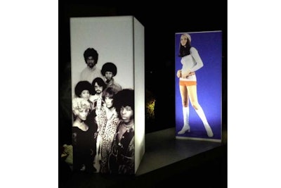 Illumina Columns branded with 70’s inspired photos for event at 1111 Lincoln Rd.