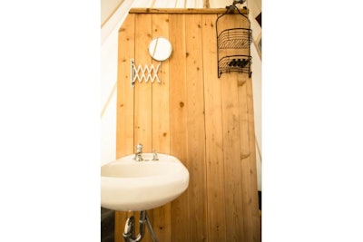 Complete with a hot water shower, flush toilet, and sink Photo: Jason Savage