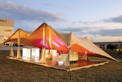 The Flex Tent from the Flex Tent Company, a subsidiary of Event Labor Works, can be stretched around trees, structures, and rocks and has expandable tent poles that adjust to uneven surfaces. Sizes start at 20 by 10 feet and can increase to any size. As the tents are modular, they can be guttered together or with other structures to form larger spaces. Flex tents are available for rent or purchase in a variety of colors and designs. Prices are available upon request.