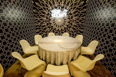 At first glance, the walls of Axor’s space—created in collaboration with Slade Architecture—appeared to be covered in decorative-arts wallpaper from the 19th century. It was, in fact, a pattern made from images of the bathroom-products brand’s fixtures.
