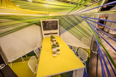 HDR and Waldner’s crisscrossing webbed design was meant to represent technology and gave the setting a very intimate feel. White mesh chairs reflected the decor overhead.