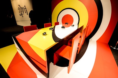 While last year Interior Design magazine focused on the past with a modern interpretation of Leonardo da Vinci’s 'Last Supper,' this year the magazine partnered with Ali Tayar. The Pop Art-style setting was inspired by the target paintings of modern master Jasper John and was intended to communicate a message of putting an end to the AIDS epidemic.