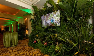 The Foyer was filled with tropical rainforest greenery to immerse guests in the experience and camouflage LED screens.