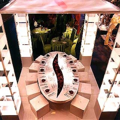 Matthew David's sleek, white oval-shaped Sephora table had a Sephora logo-shaped channel filled with water, red and pink marbles, Sephora lipsticks and small floating flowers. (Photo by Roberto D'Addona)