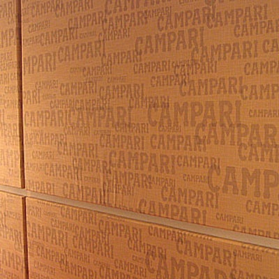 Italian spirit Campari made a play for the New York art scene in 2006 with the launch of the House of Campari pop-up gallery in SoHo. House of Campari brought the work of 25 New York-based visual artists together under one roof in an exhibition called “25 Bold Moves.' For a subtle on-brand effect, John Sideris of Sideris Creative was enlisted to create tone-on-tone fabric wall coverings bearing the Campari logo.