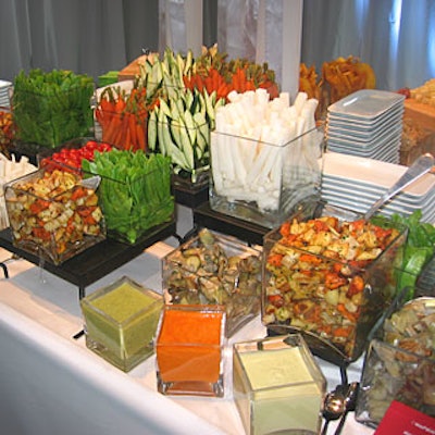 AOL took a farmer’s market approach to the after-party food stations. Guests could find meat, chicken, cheeses, vegetables, breads, and dips neatly arranged in square glass jars on metal risers and atop wooden cutting boards.