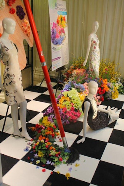Clothing store Boyds, which incorporated flowers into a display with an oversize paintbrush and paint palette, was awarded Best Use of Flowers and Greenery.