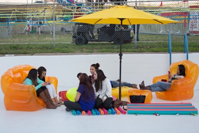 To take full advantage of the space at Palm Park for IFC's Fairgrounds activation—and match the TV network's “Always on. Slightly off” branding—Lead Dog Marketing Group created a lounge inside the empty pool dubbed the Deep End Theater. Pool floats and loungers served as furniture, and the Alamo Drafthouse curated screenings of pop-culture moments for entertainment.