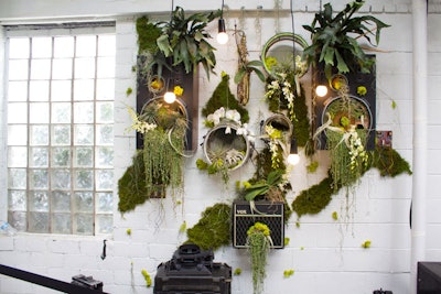Extending the green theme of the Spotify House, Austin-based Articulture Designs created a musical living wall, embedding air plants and greenery in speakers and instruments that were mounted on the wall.