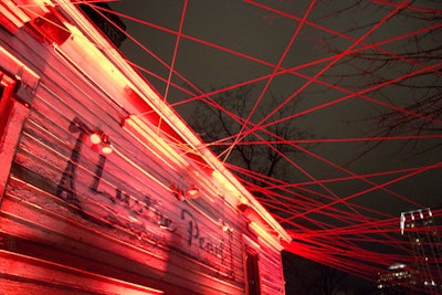 An intricate orange string installation covered the exterior of the SoundCloud Clubhouse’s setup on Rainey Street.