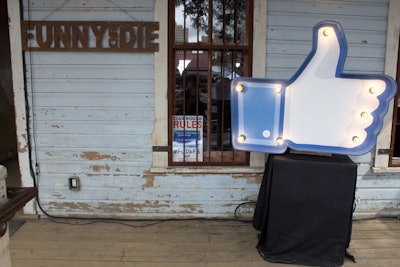 Marquee-style signage also appeared at a number of events and promotions. At the Funny or Die Clubhouse/Facebook Pop-Up headquarters, an oversize version of Facebook's Like symbol stood on the porch.