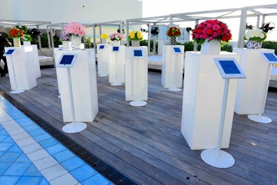 At the event, Kalla arrangements were displayed on pedestals. Each bouquet had a corresponding iPad that offered more information.